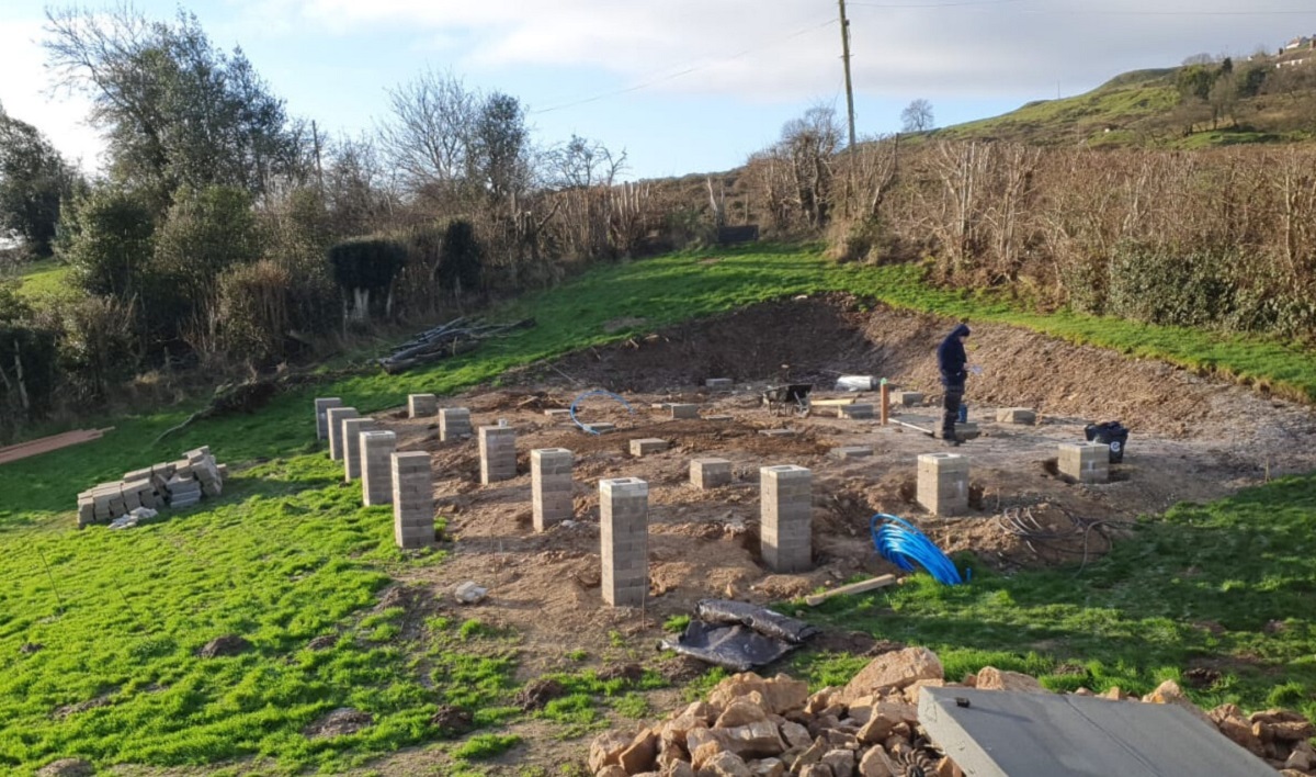 photo of the foundation piers which will support the log cabin annexe